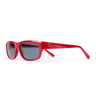 Red rectangular sunglasses with dark gray lenses, 'DEPT. de la GALERE' embedded logo in gold on the temple arm, gold 'G-Ball' studs on the ear tip, shown on a plain white background.