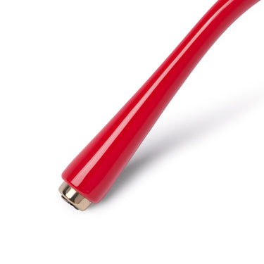 Ear tip detail shot of red sunglasses with a gold 'G-Ball' stud on the ear tip, shown on a plain white background.