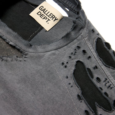 Close-up of the faded charcoal tee showing the distressed ribbed collar, interior neck label, and heavy distressing around the neckline.