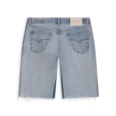 Back view of light-wash blue denim shorts laid flat against a white background, featuring two back pockets with curved contrast stitching, darker blue panels along the inner and outer legs, and a white “GALLERY DEPT.” jacron on the upper right waistband. The denim has a faded finish, with unfinished hems and loose frayed threads.